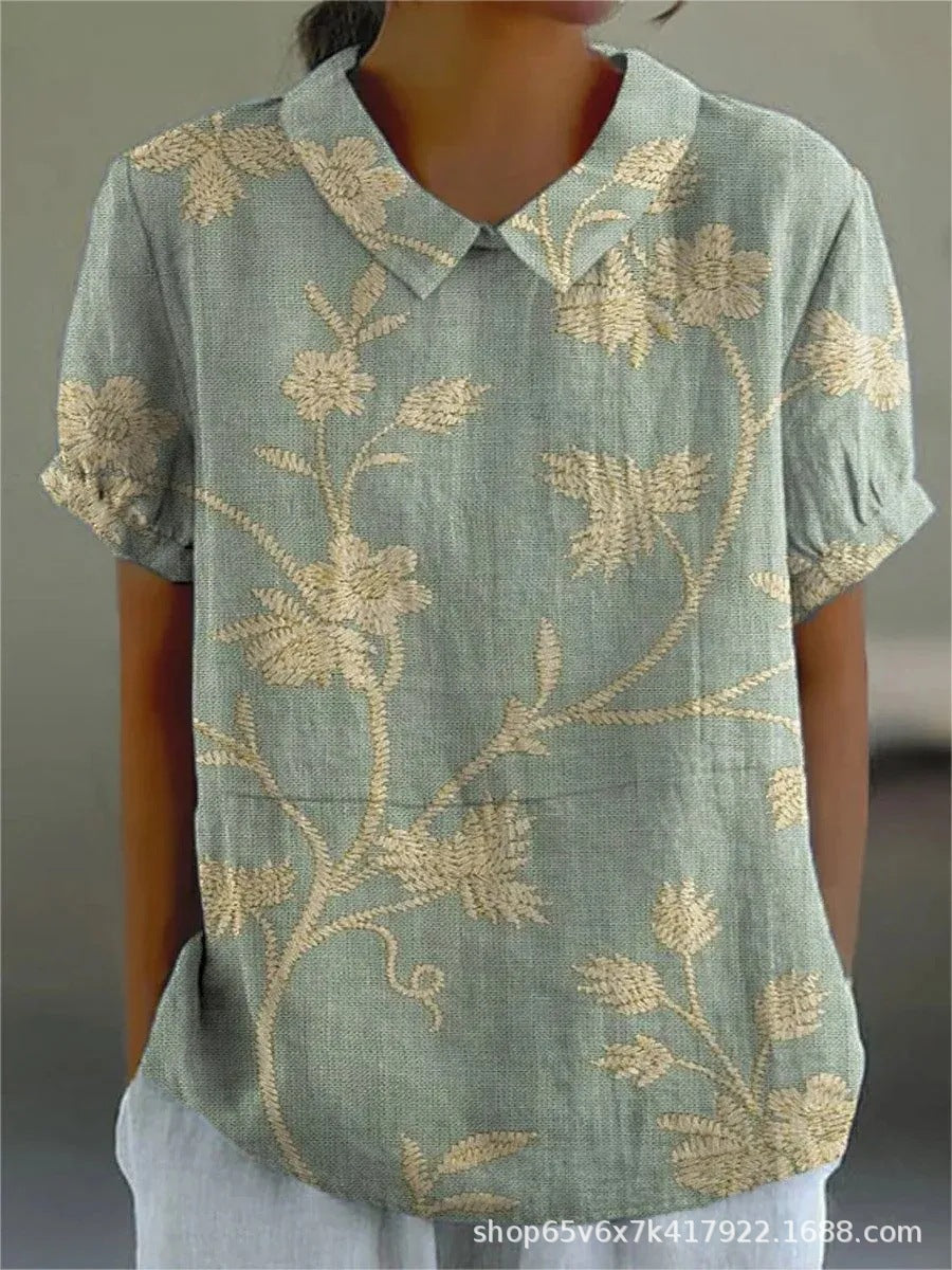 Dames blouse met bloemenprint en korte mouwenb 