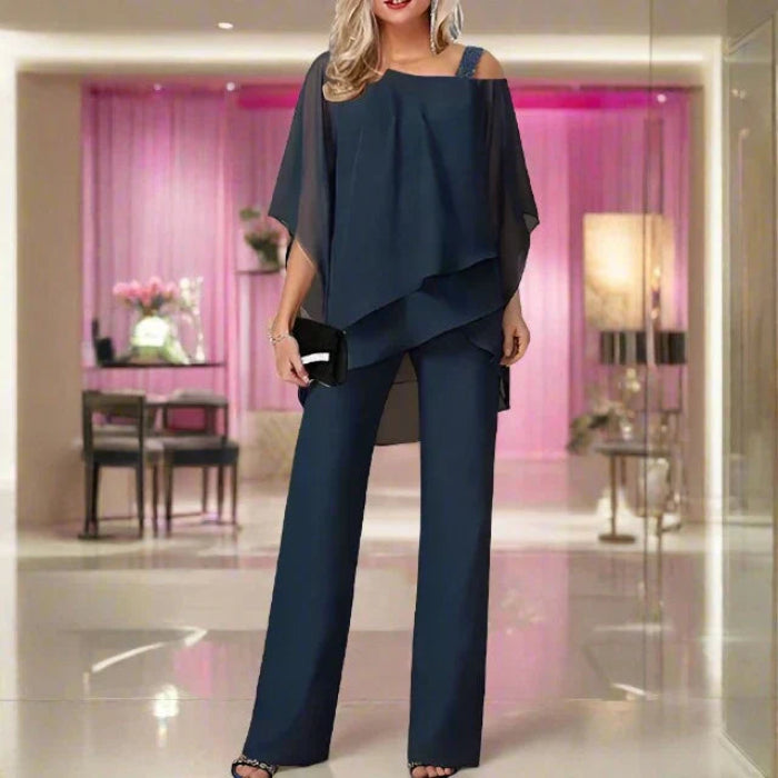 Elegante asymmetrische set met blouse en soepelvallende broek